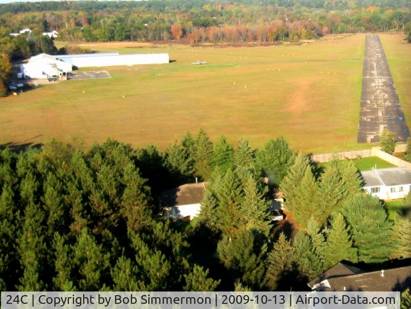 Lowell City Airport (24C) - Short final for RWY 30.