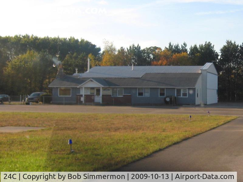 Lowell City Airport (24C) - The FBO's office.  Note the wood stove smoke.  Nice place to stop.
