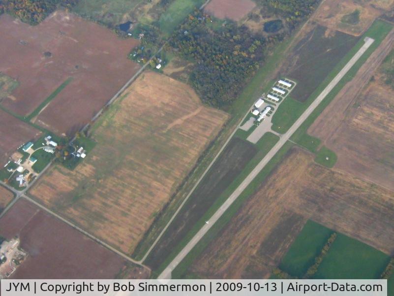 Hillsdale Municipal Airport (JYM) - View from 7500' with what looks to be an ultralight strip just north of the field.
