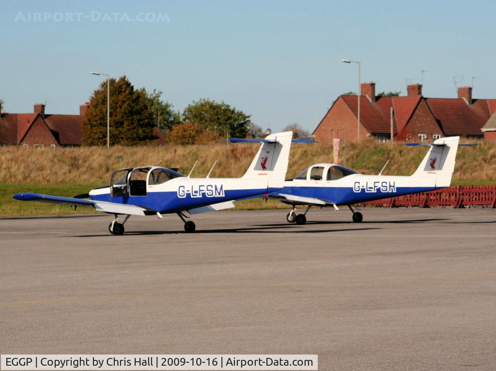 Liverpool John Lennon Airport, Liverpool, England United Kingdom (EGGP) - G-LFSM and G-LFSH Piper PA-38-112 of the Liverpool Flying School