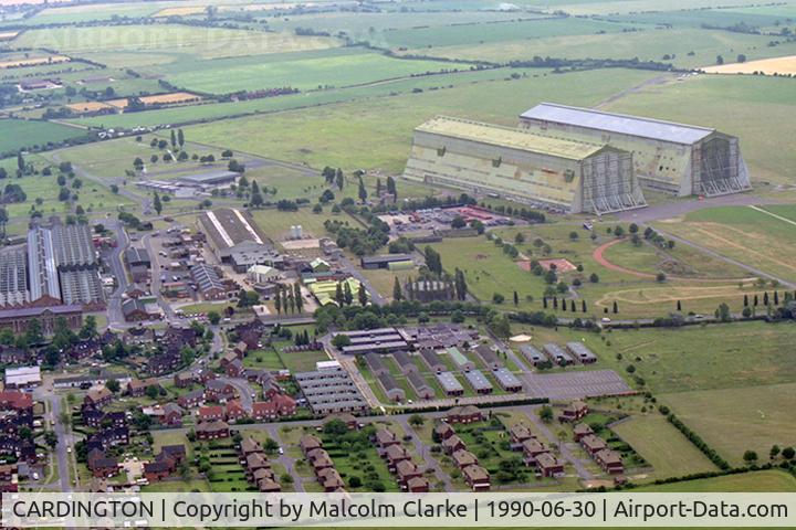 CARDINGTON Airport - RAF Cardington, UK (Closed), taken during a flight in Airship Industries Skyship 600 G-SKSC. The historic airship sheds in the background.