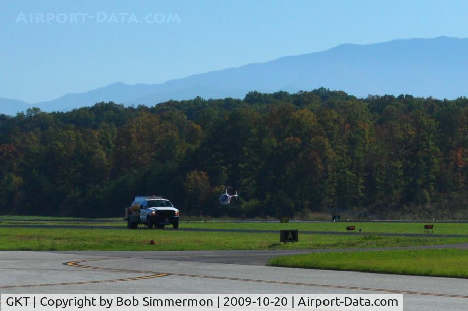 Gatlinburg-pigeon Forge Airport (GKT) - Helicopter activity and the fuel truck.