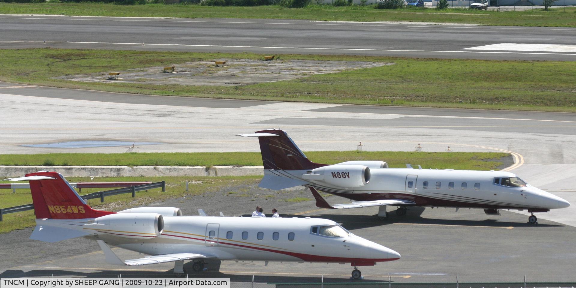 Princess Juliana International Airport, Philipsburg, Sint Maarten Netherlands Antilles (TNCM) - Both hopper jets park at the cargo ramp. hopper jet 88 &54