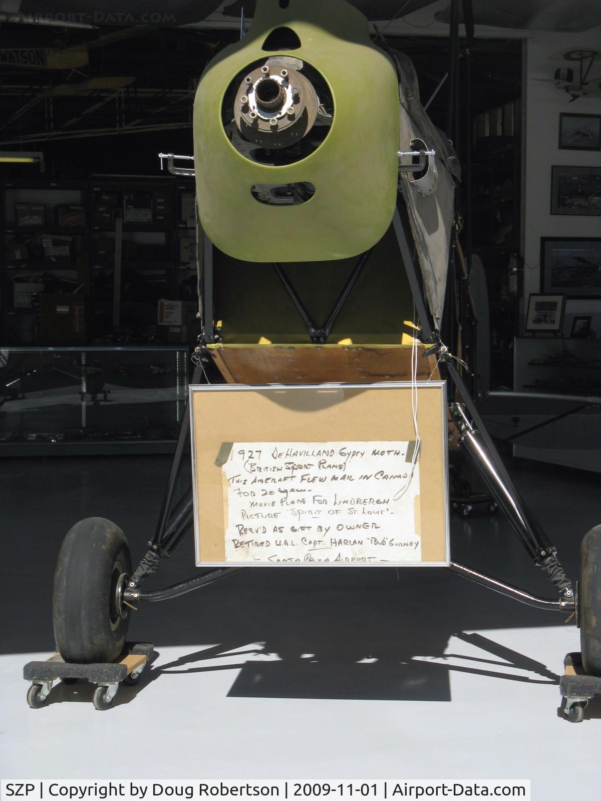 Santa Paula Airport (SZP) - 1927 DeHavilland Gipsy Moth-received as gift-in the David Watson Aviation Museum of Santa Paula hangar