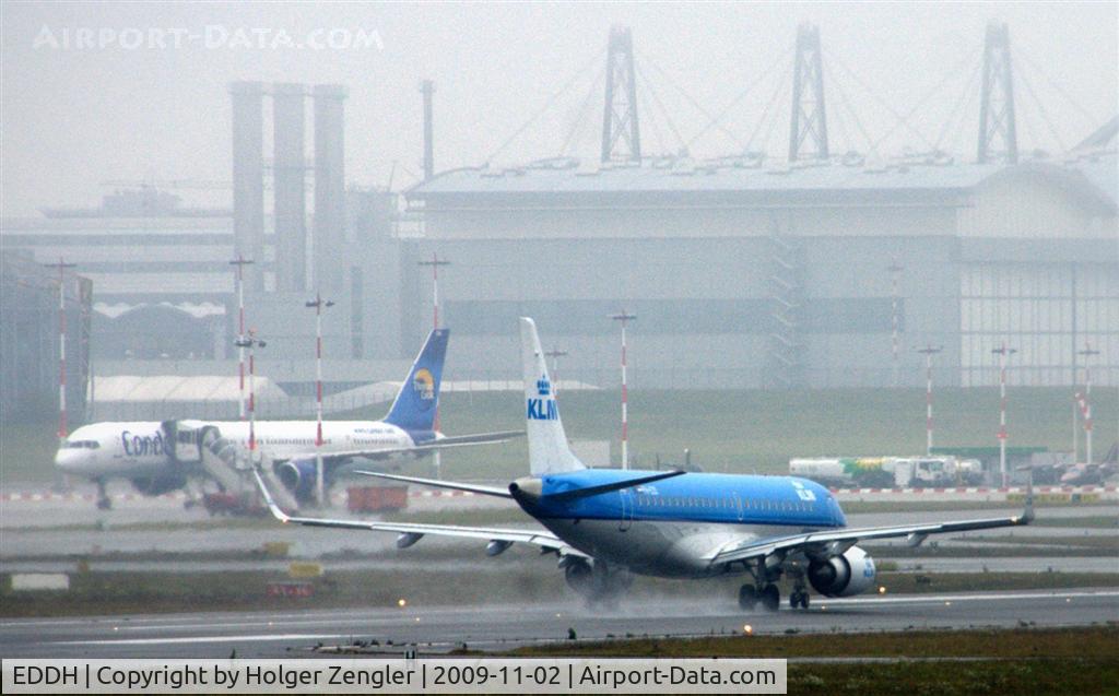 Hamburg Airport, Hamburg Germany (EDDH) - Take off to Amsterdam on pretty wet runway 32