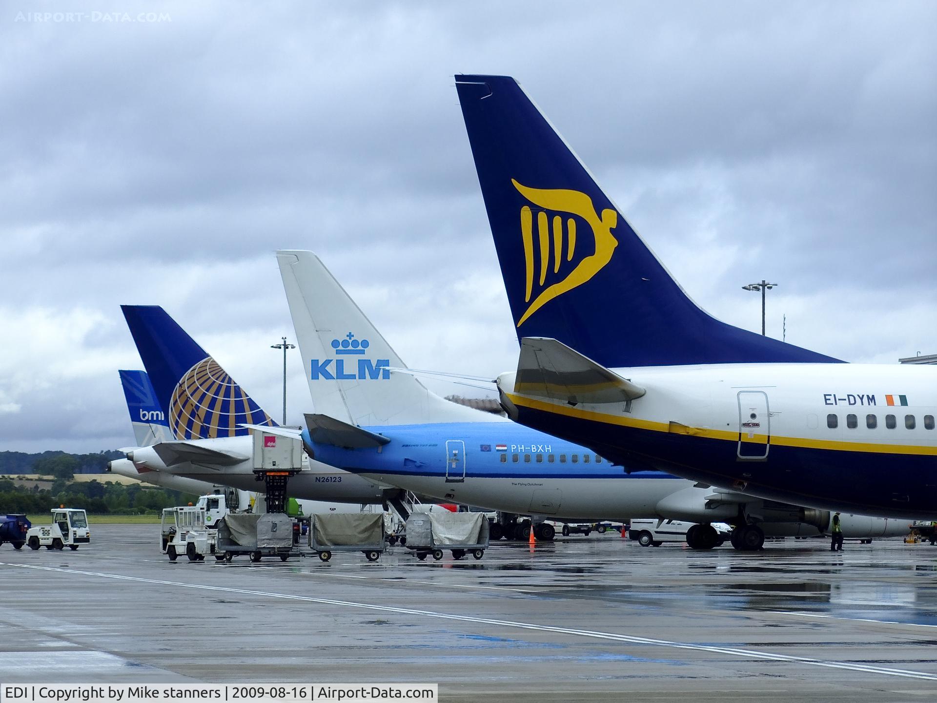 Edinburgh Airport, Edinburgh, Scotland United Kingdom (EDI) - A line up of tails at Edinburgh airport,taken from Almond road car park