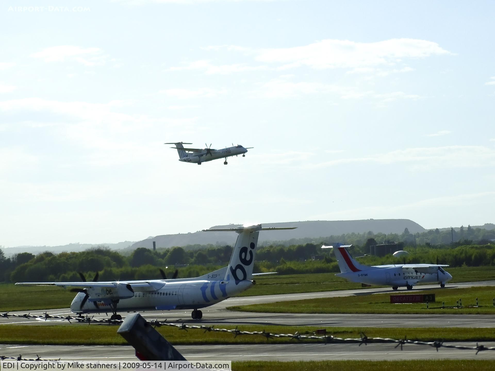 Edinburgh Airport, Edinburgh, Scotland United Kingdom (EDI) - G-ECOD On finals for Runway 06,With G-BYMK & G-JECP Waiting to take off