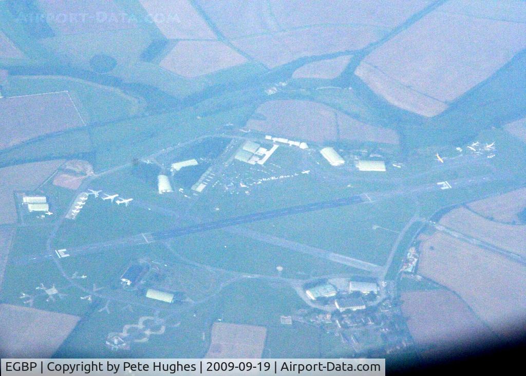 Kemble Airport, Kemble, England United Kingdom (EGBP) - Kemble seen from G-ECOM departing Southampton.  Far right are aircraft being scrapped, to left are stored BAe146 and 747s.