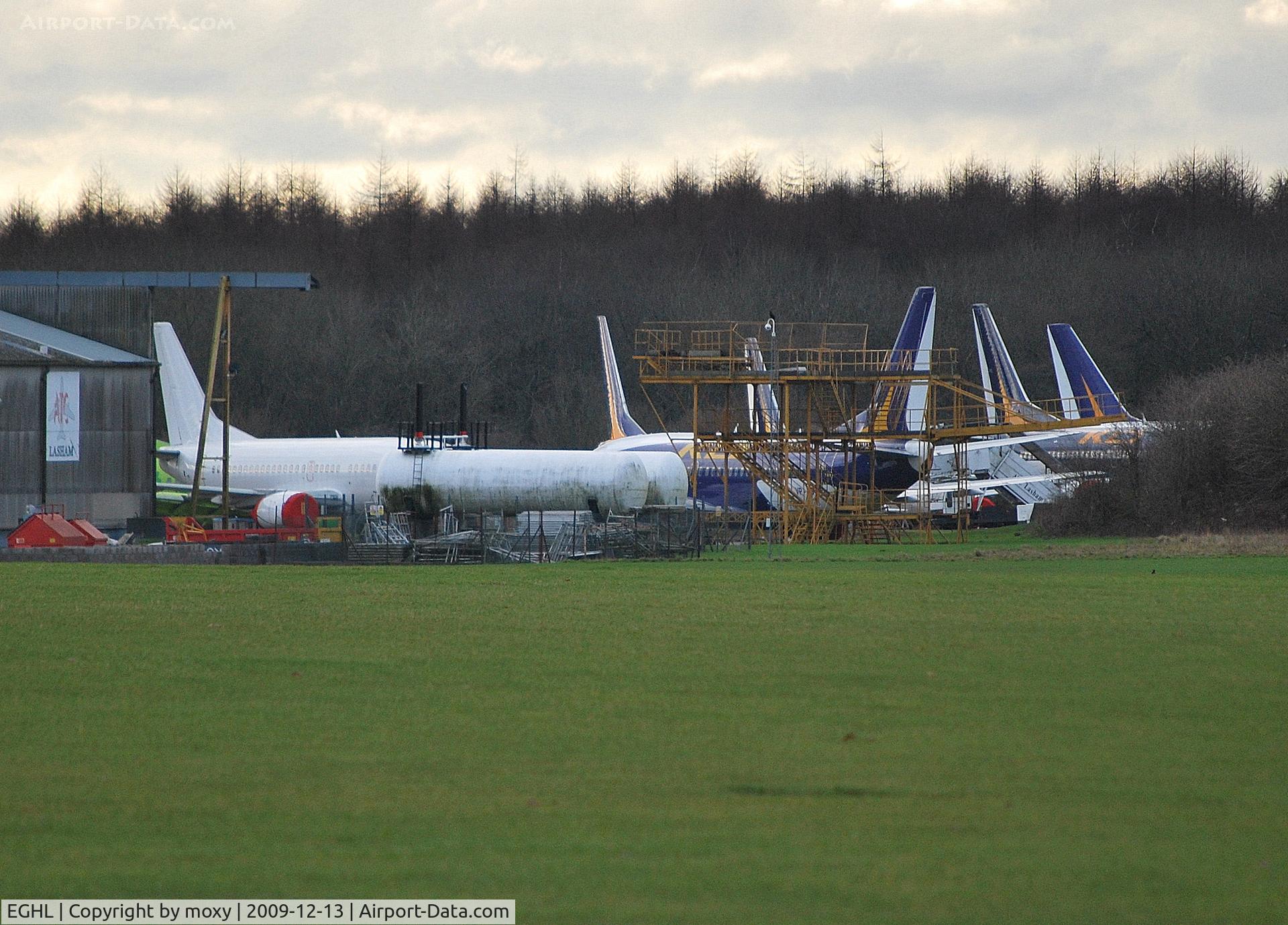 Lasham Airfield Airport, Basingstoke, England United Kingdom (EGHL) - Some of the heavy metal stored at ATC's facility.