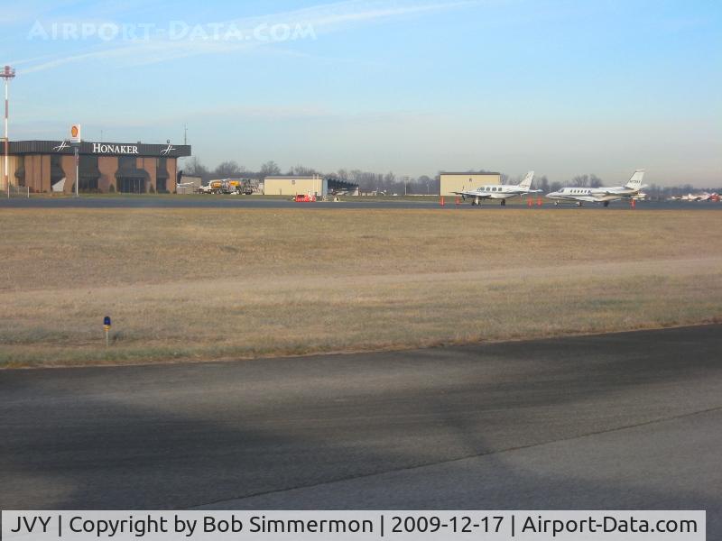 Clark Regional Airport (JVY) - Looking NW towards Honaker's ramp and the T-hangers.