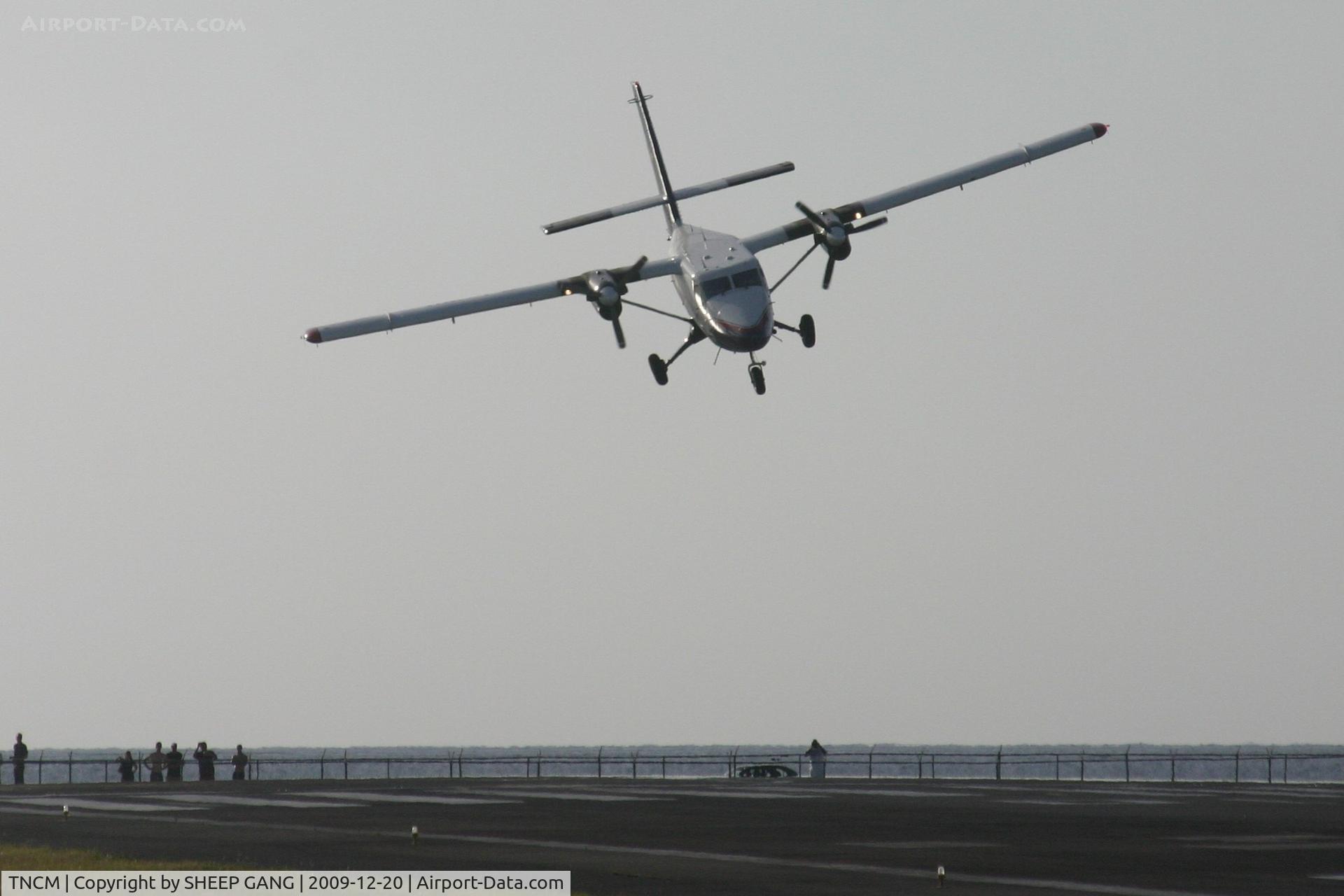 Princess Juliana International Airport, Philipsburg, Sint Maarten Netherlands Antilles (TNCM) - Winair doing a nice nose dive over the tresh hold