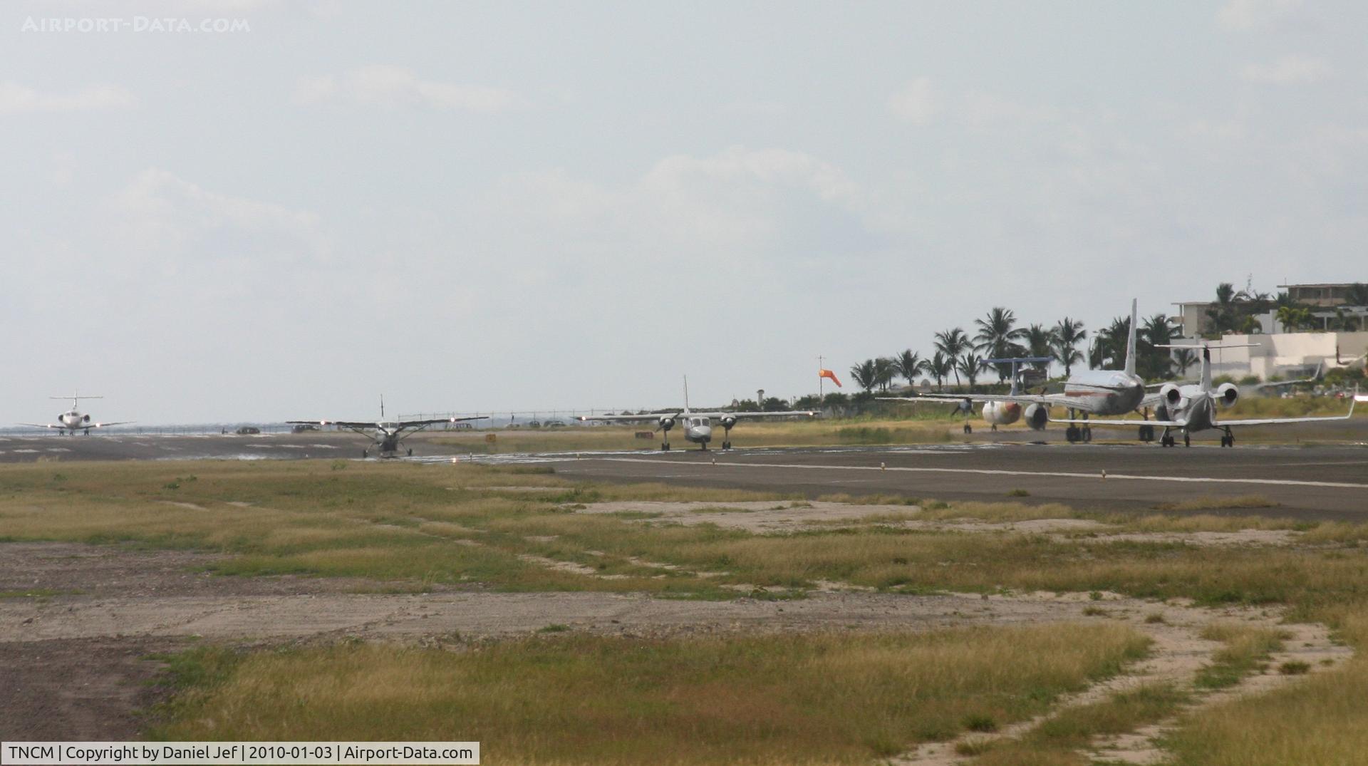 Princess Juliana International Airport, Philipsburg, Sint Maarten Netherlands Antilles (TNCM) - The active runway get real buzy at TNCM