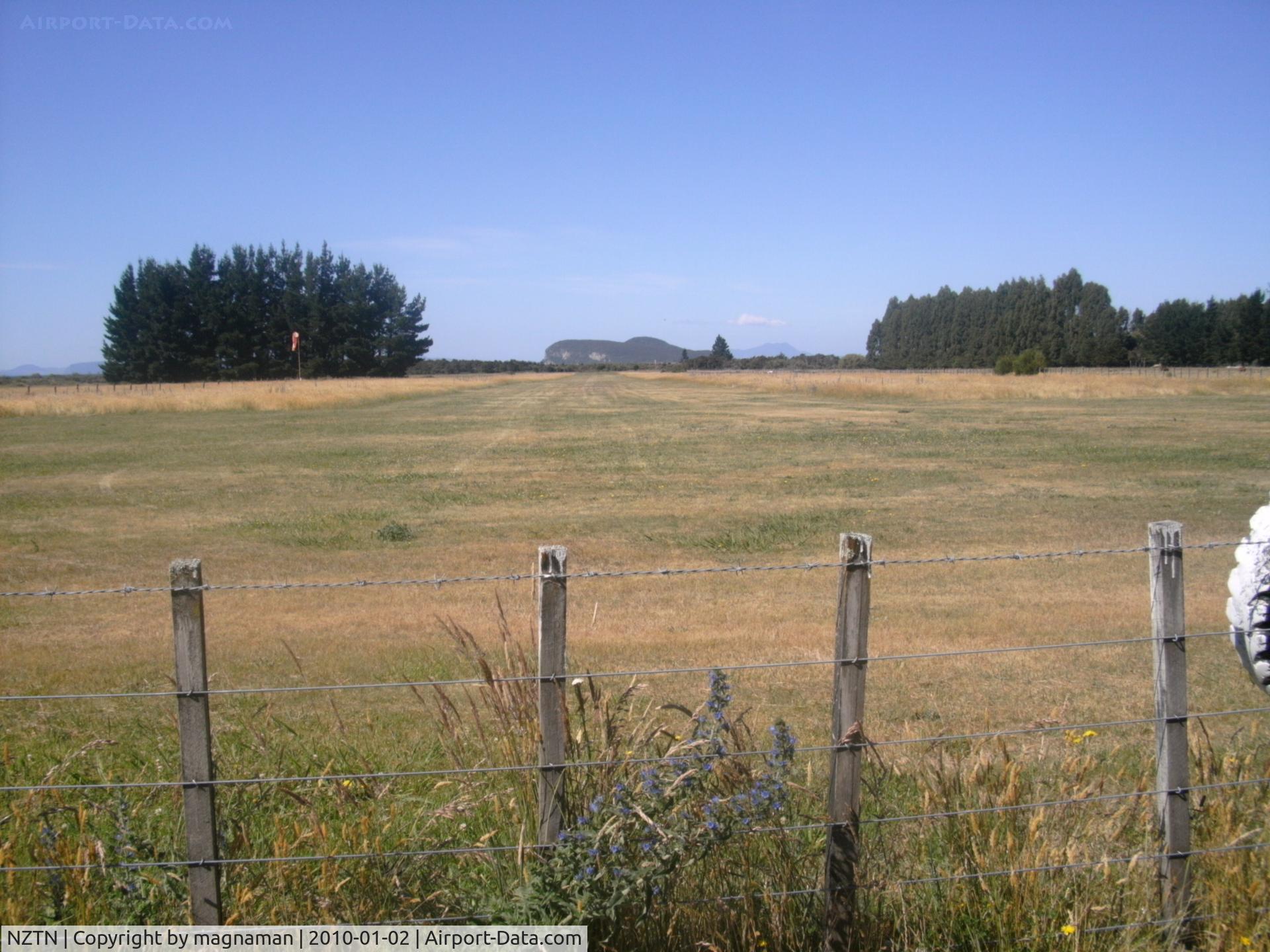 Turangi Aerodrome Airport, Turangi New Zealand (NZTN) - Off Grace Road at north end of Turangi - threshold of grass strip c 030/210 alignment