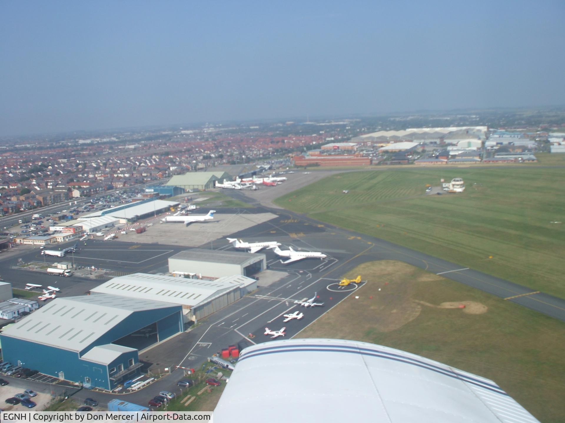 Blackpool International Airport, Blackpool, England United Kingdom (EGNH) - Aerial view of Blackpool Airport taken from a PA-28.Two Gulf 5s are on stand 1