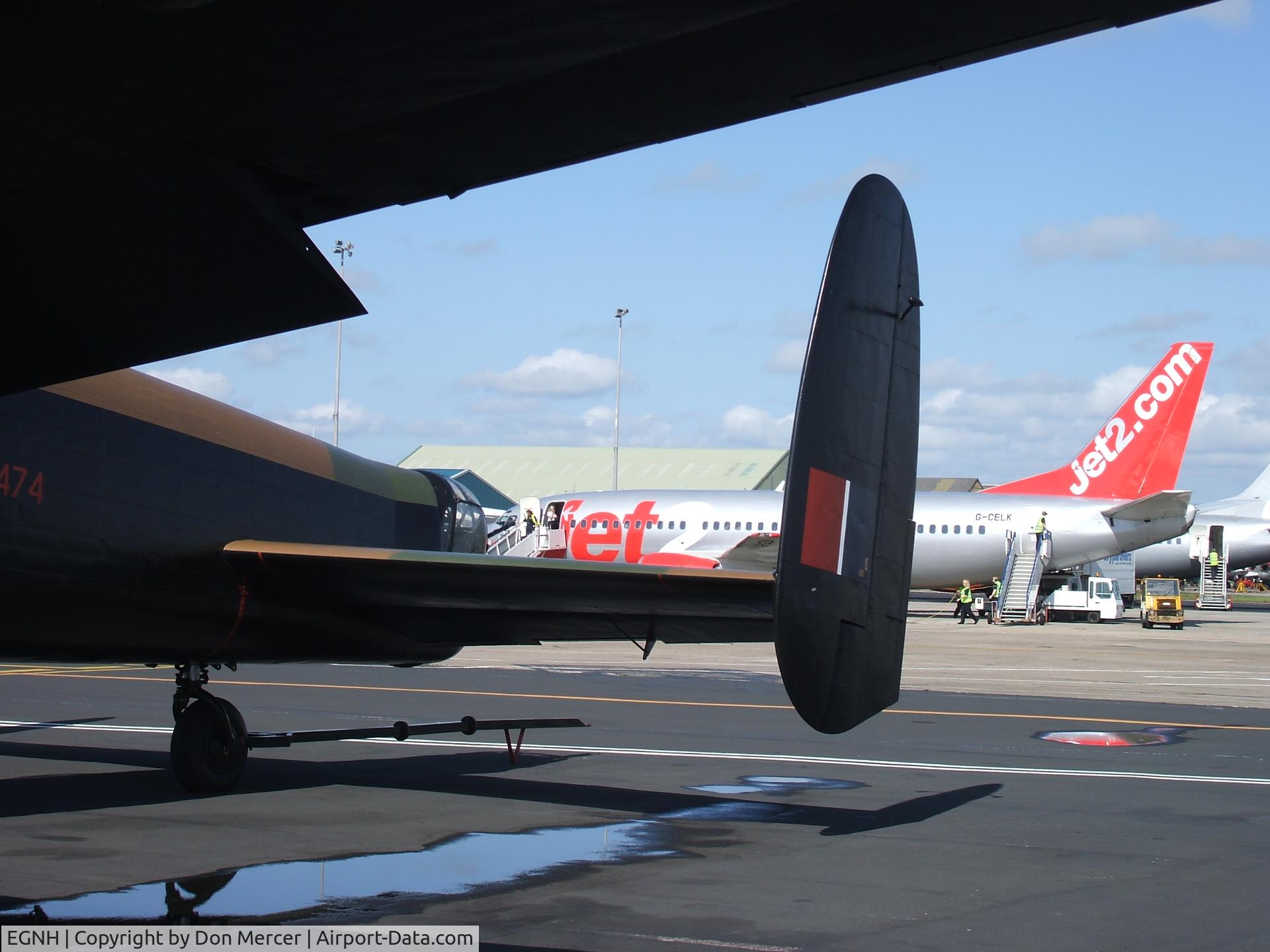 Blackpool International Airport, Blackpool, England United Kingdom (EGNH) - Jet2 under Lancaster wing