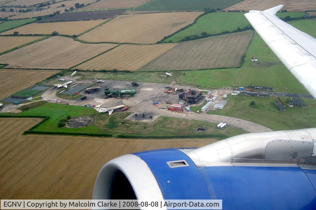 Durham Tees Valley Airport, Tees Valley, England United Kingdom (EGNV) - The fire training area at Durham Tees Valley Airport, UK from A319-131 G-DBCF in 2008.