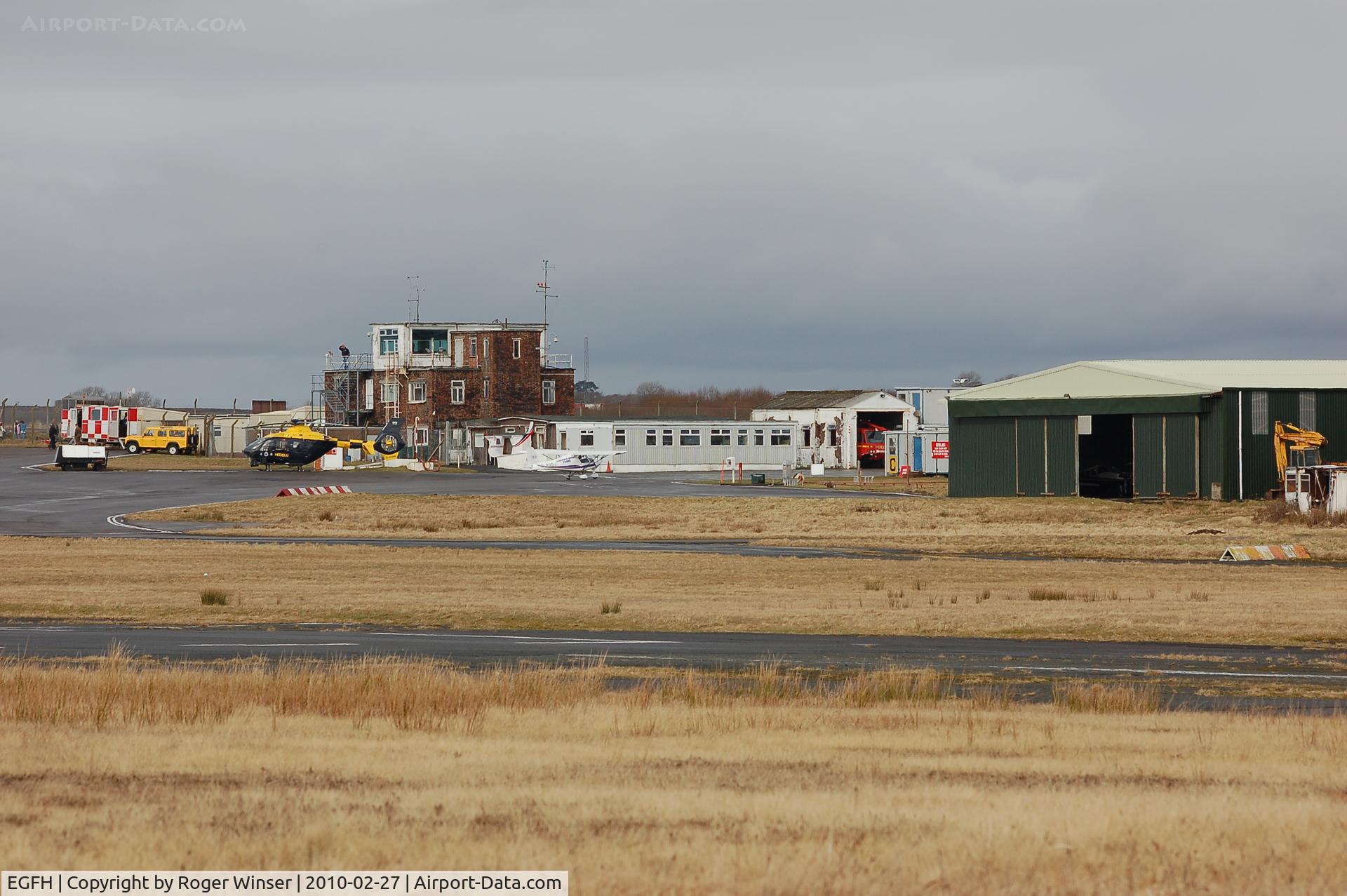 Swansea Airport, Swansea, Wales United Kingdom (EGFH) - View of airport buildings and Bellman hangar (Hangar 2). 