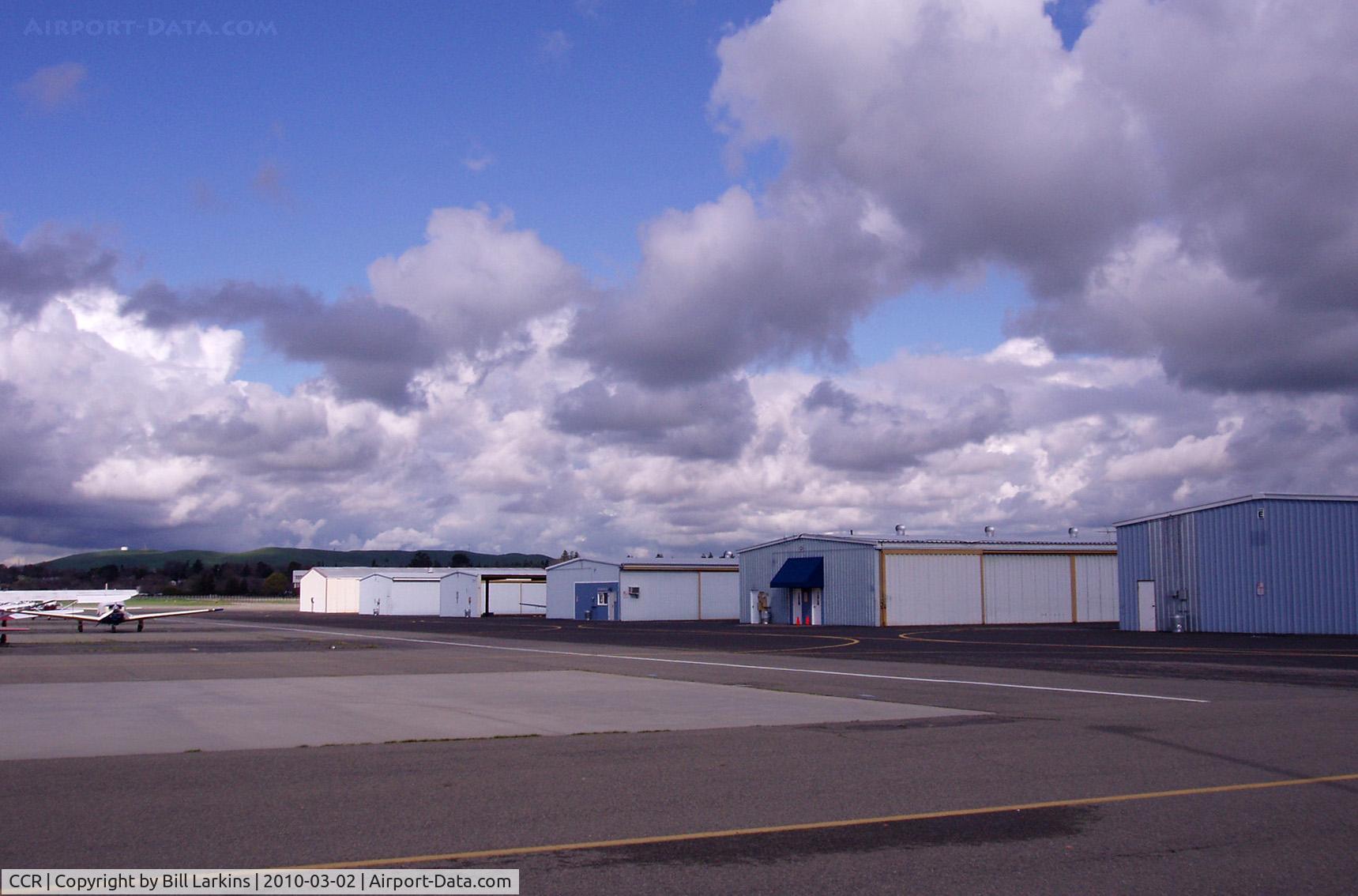 Buchanan Field Airport (CCR) - Small hangars on the East Ramp near Concord. Pilots lounge at the blue awning. 