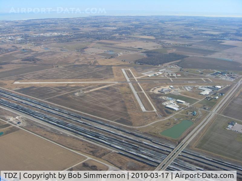 Toledo  Executive Airport (TDZ) - Looking NE with Lake Erie in visible in the distance.