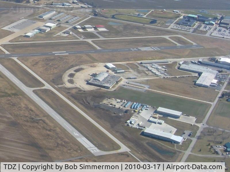 Toledo  Executive Airport (TDZ) - Old terminal in the foreground with newer facilities beyond.