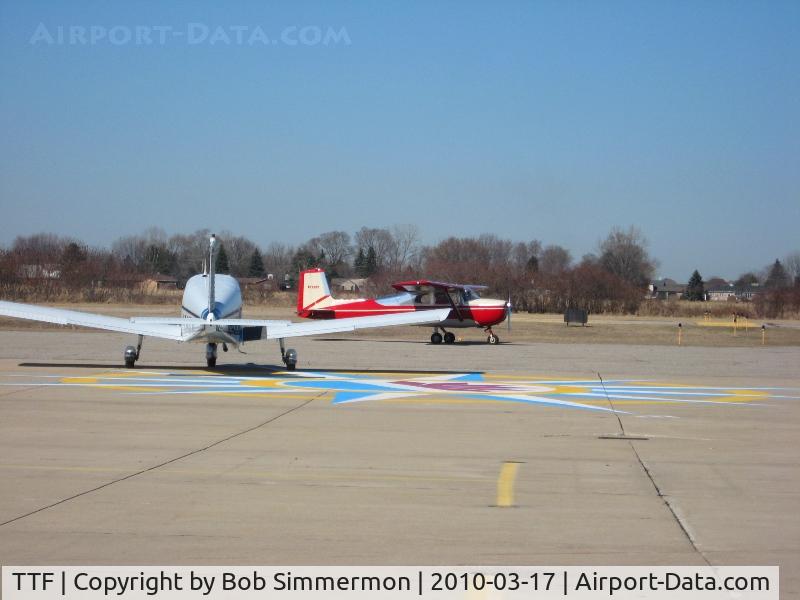 Custer Airport (TTF) - Departing traffic on the ramp (N1200Y & N5437W)
