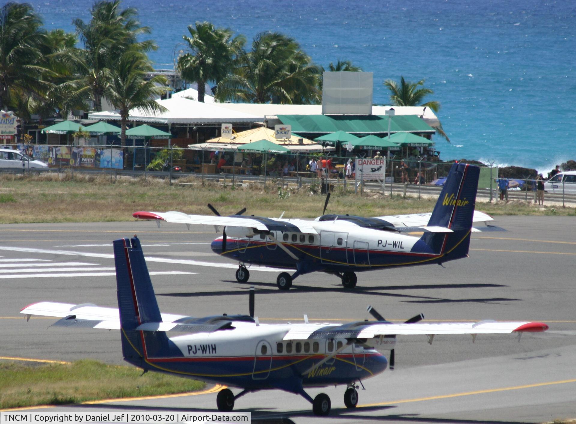 Princess Juliana International Airport, Philipsburg, Sint Maarten Netherlands Antilles (TNCM) - The local boys having a field day!!!!