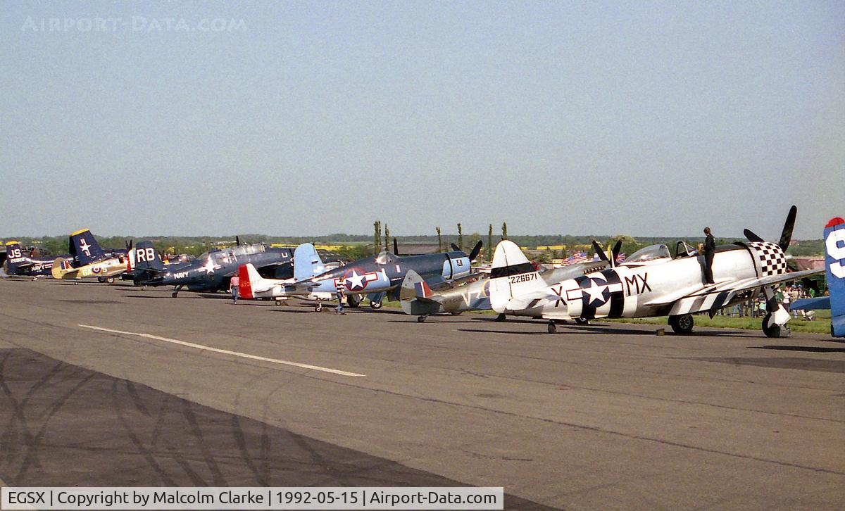 North Weald Airfield Airport, North Weald, England United Kingdom (EGSX) - The line-up of warbirds at North Weald during Air Show Europe in 1992.
