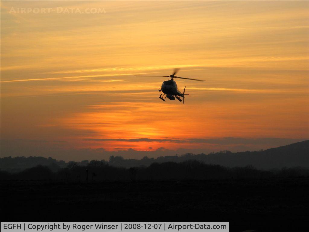Swansea Airport, Swansea, Wales United Kingdom (EGFH) - Arriving at dusk