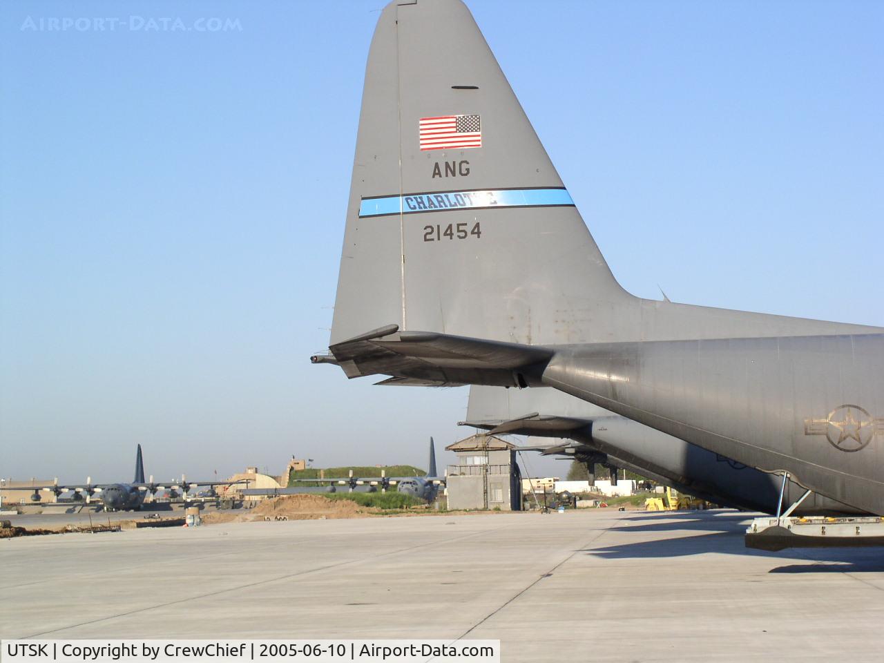 Karshi_Airport, Karshi Uzbekistan (UTSK) - Flight Line at K2 Uzbekistan with NCANG C-130H3 92-1454