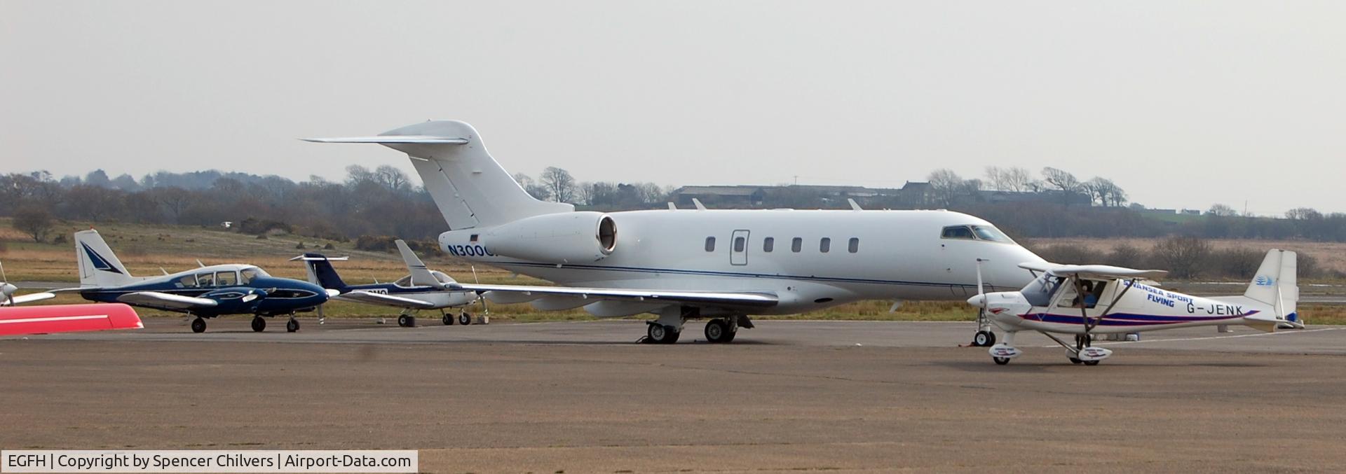 Swansea Airport, Swansea, Wales United Kingdom (EGFH) - N300GP BD100 Challenger 300. And G-JENK ahead.