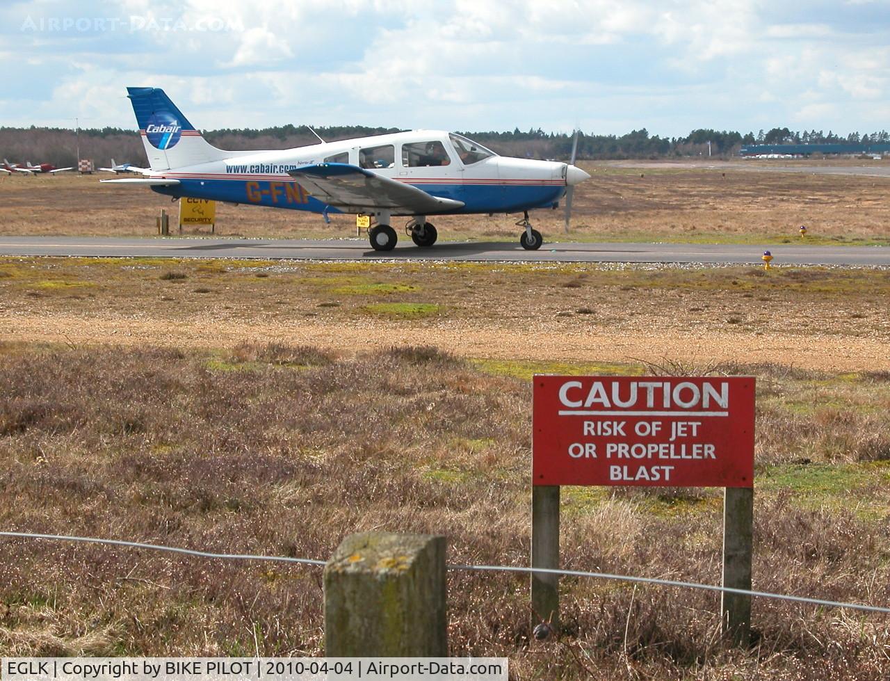 Blackbushe Airport, Camberley, England United Kingdom (EGLK) - PIPER PA-28-161 G-FNPT TAXYING TO RWY 25 