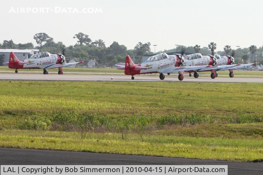 Lakeland Linder Regional Airport (LAL) - Aeroshell Team AT-6's departing RWY 9.