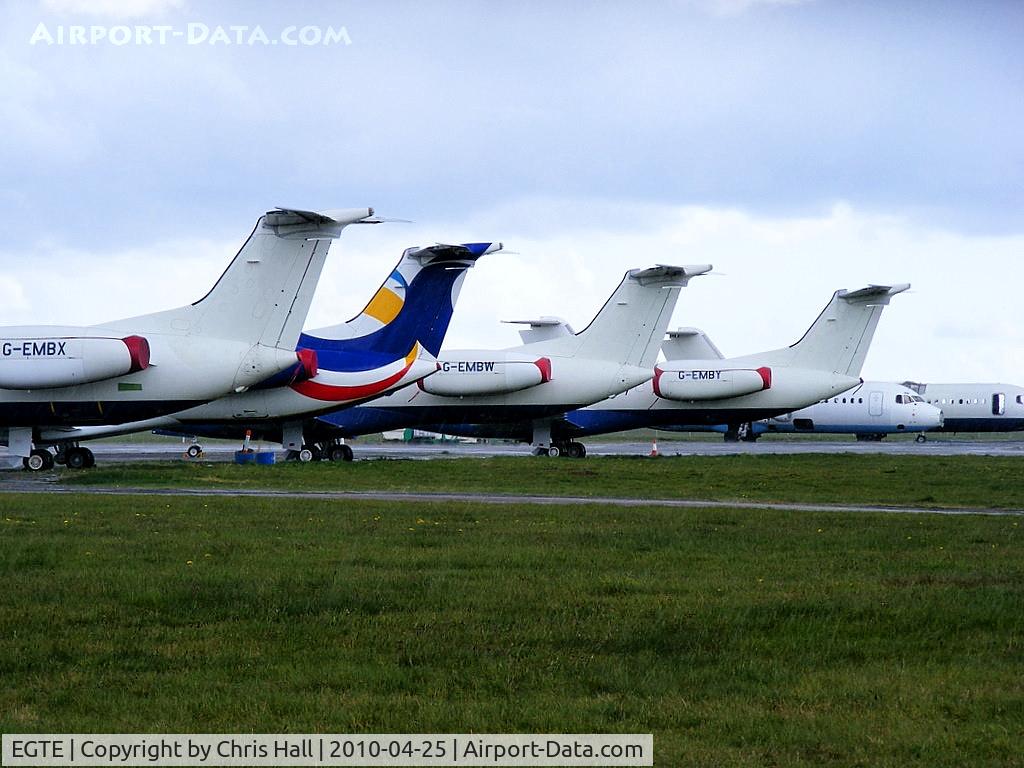 Exeter International Airport, Exeter, England United Kingdom (EGTE) - Embraer ERJ-145's and BAe 146's in storage at Exeter Airport