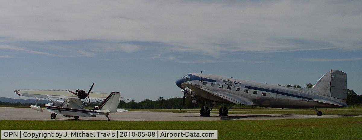 Thomaston-upson County Airport (OPN) - DC-3 and Searay at KOPN fuel ramp.