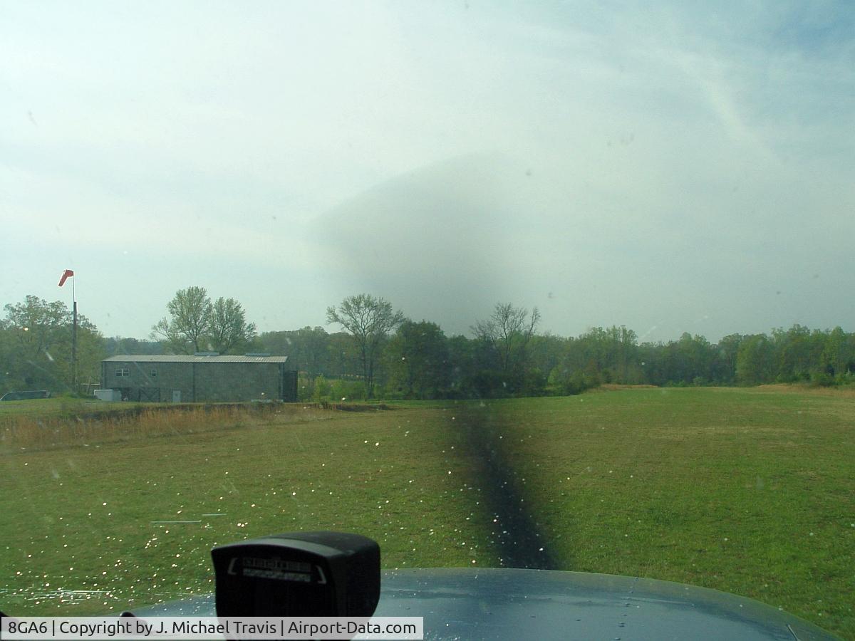 S & S Landing Strip Airport (8GA6) - Low pass at S & S in a C172.  Couldn't land with a nose dragger, airport owners request ;-)