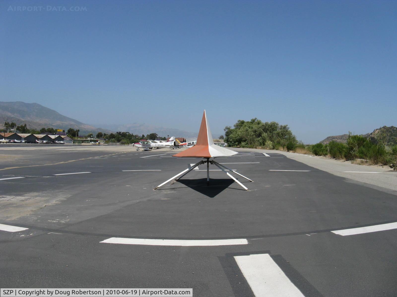 Santa Paula Airport (SZP) - Wind Tetrahedron, adjacent Helipad, Midfield-south.