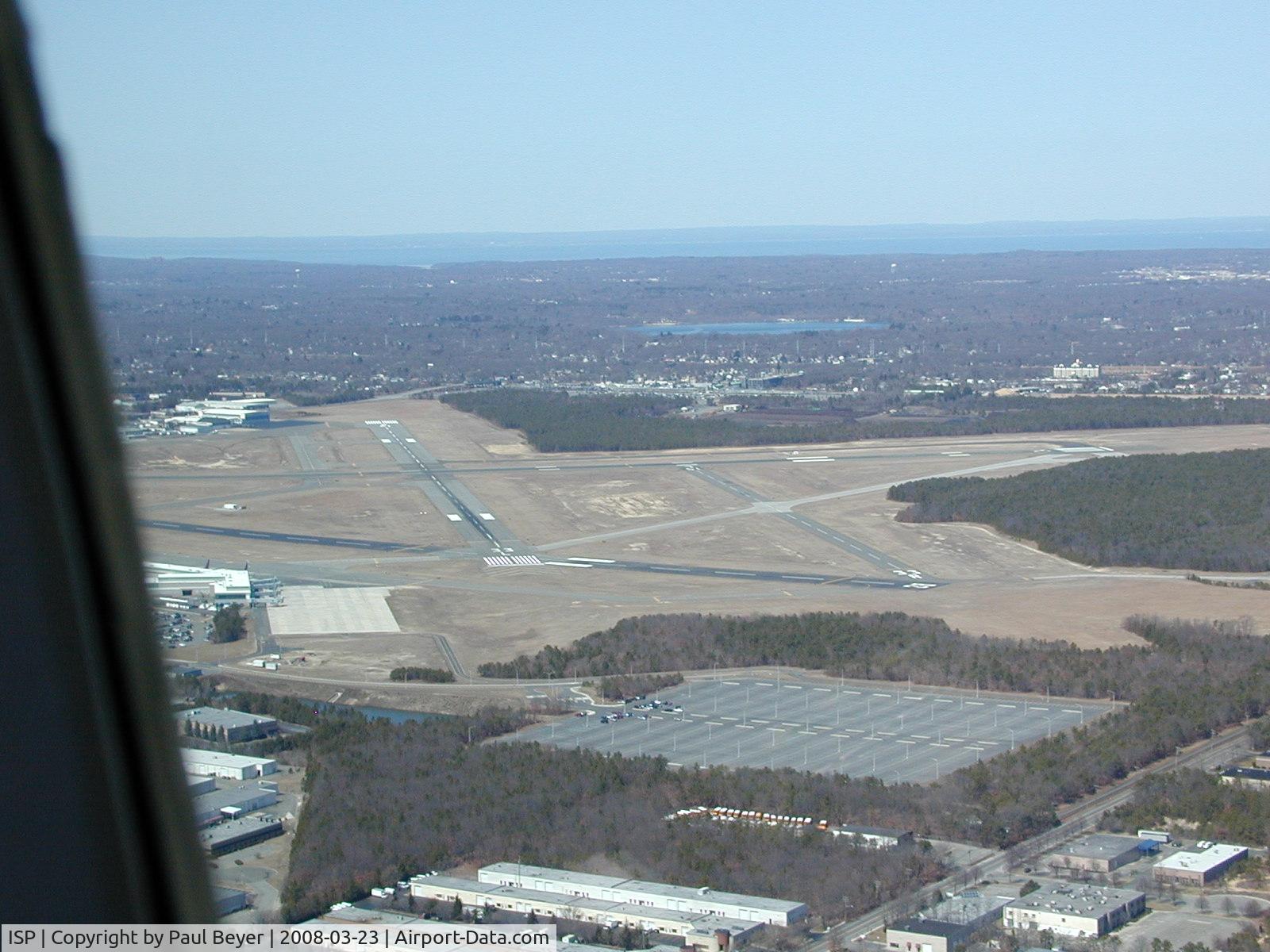 Long Island Mac Arthur Airport (ISP) - Landing at Islip on a clear March morning.