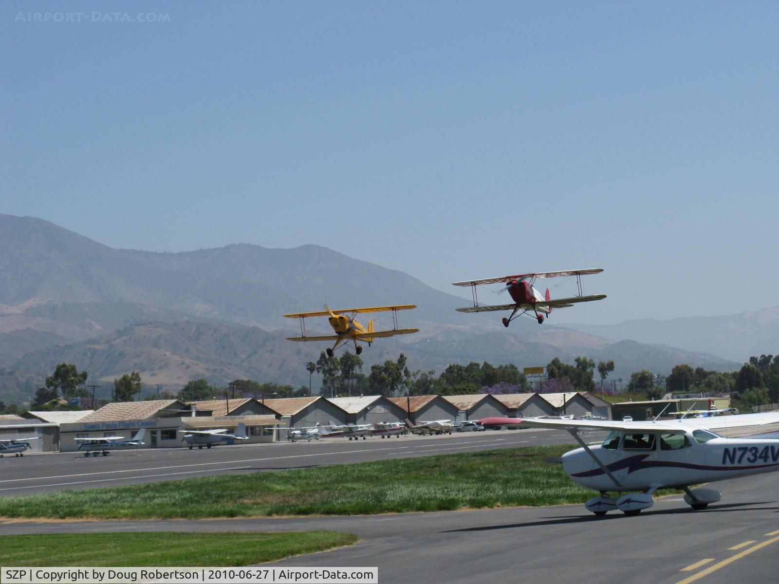 Santa Paula Airport (SZP) - N53EH and N3G in tandem takeoff Rwy 22 at the National Bucker Fly-In
