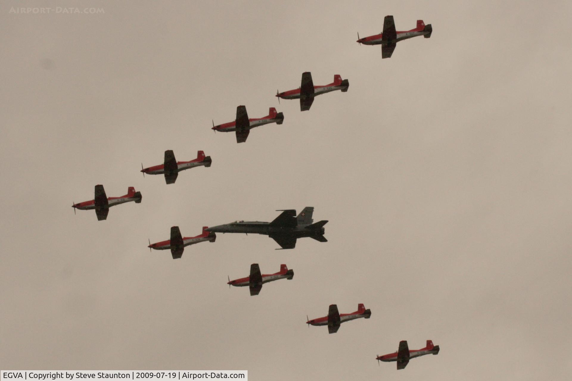 RAF Fairford Airport, Fairford, England United Kingdom (EGVA) - Taken at the Royal International Air Tattoo 2009 - PC-7 Team display with F-18
