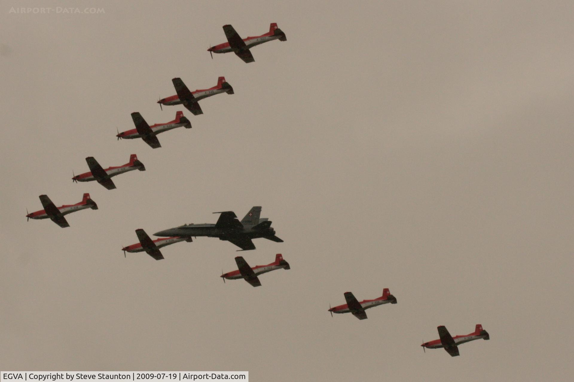 RAF Fairford Airport, Fairford, England United Kingdom (EGVA) - Taken at the Royal International Air Tattoo 2009 - PC-7 Team display with F-18