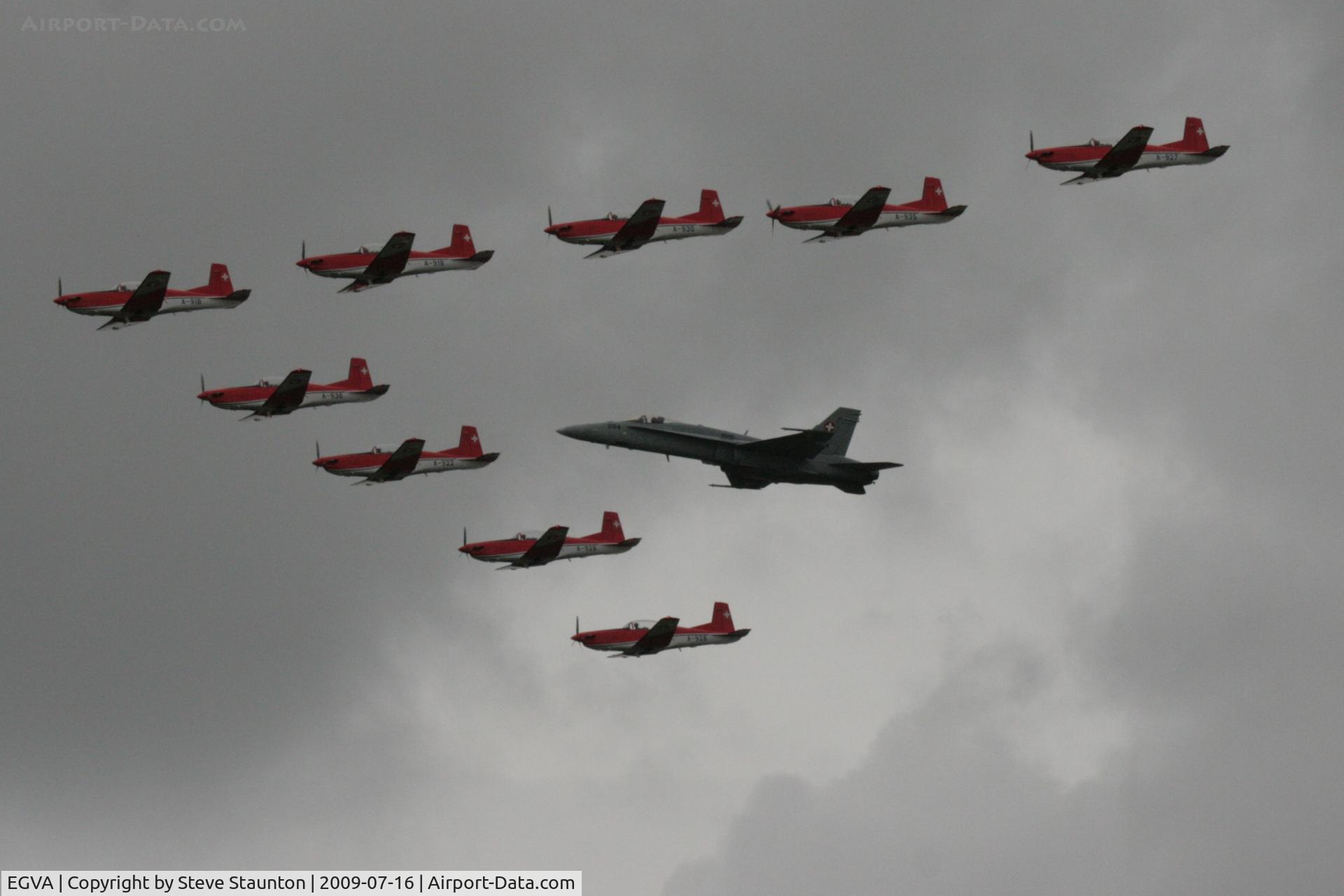 RAF Fairford Airport, Fairford, England United Kingdom (EGVA) - Taken at the Royal International Air Tattoo 2009 - PC-7 Team display with F-18