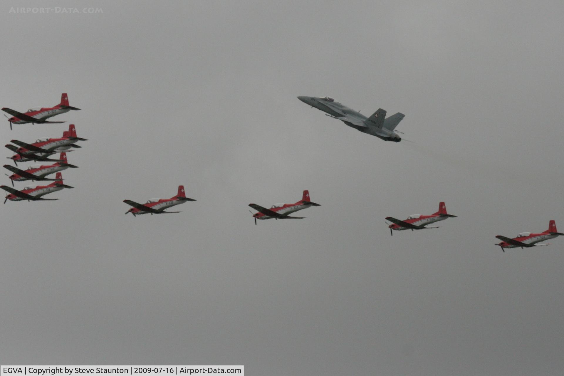RAF Fairford Airport, Fairford, England United Kingdom (EGVA) - Taken at the Royal International Air Tattoo 2009 - PC-7 Team display with F-18