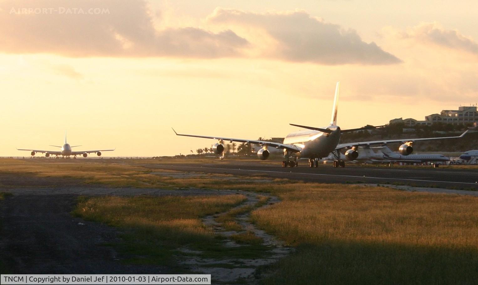 Princess Juliana International Airport, Philipsburg, Sint Maarten Netherlands Antilles (TNCM) - Two big birds on the active at the same time!!!!!