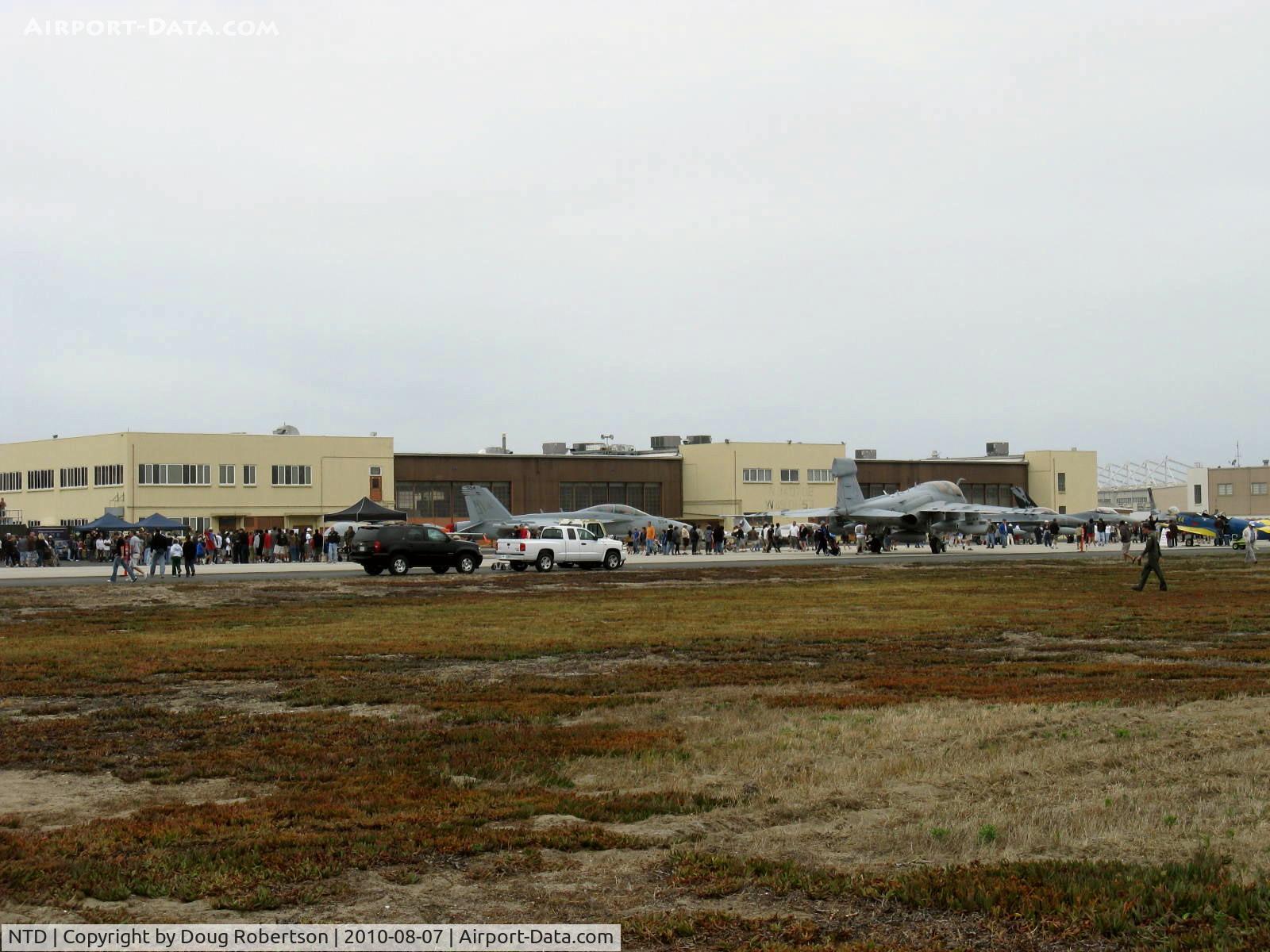 Point Mugu Nas (naval Base Ventura Co) Airport (NTD) - Bldg 352, Weapons Program Management Dept. and hangars. My office Center Bay 1983-1991. AGM-88A, -88B HARM missile Technical Manager 1983-1995. NTD's crosswind runway alongside.