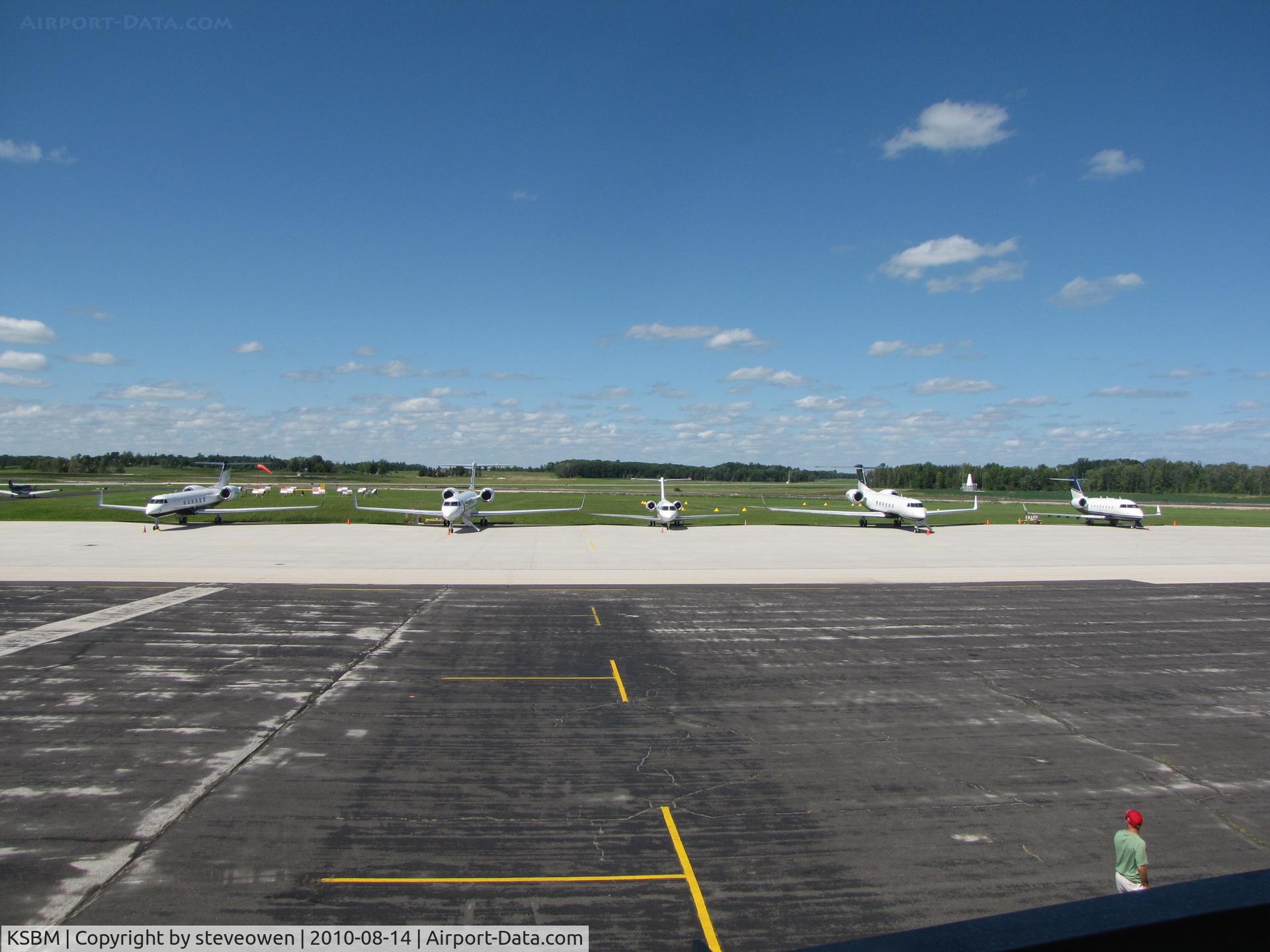 Sheboygan County Memorial Airport (SBM) - Taken across the ramp during a lull in Ops for the PGA Tour