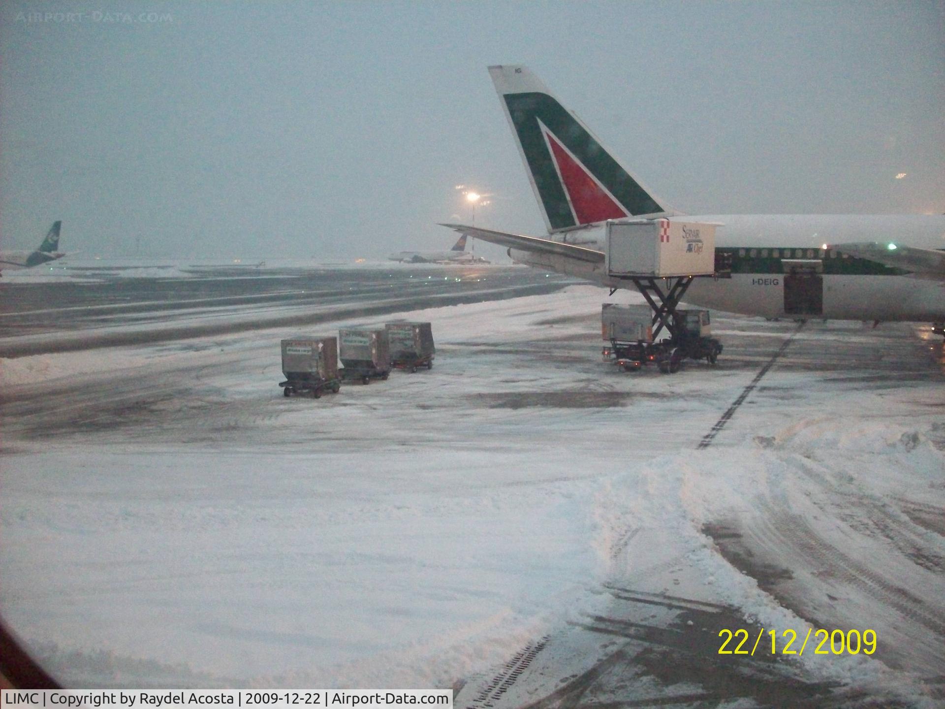 Malpensa International Airport, Milan Italy (LIMC) - Bad whether and low visivility.