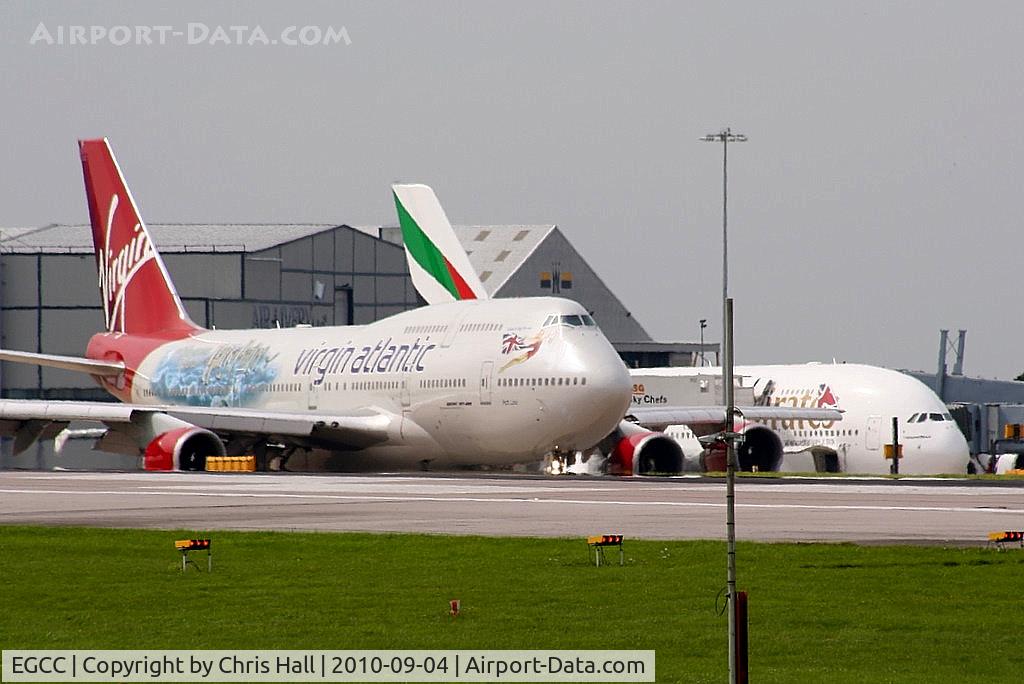 Manchester Airport, Manchester, England United Kingdom (EGCC) - Virgin Atlantic B747 G-VLIP taxying past Emirates A380 A6-EDL