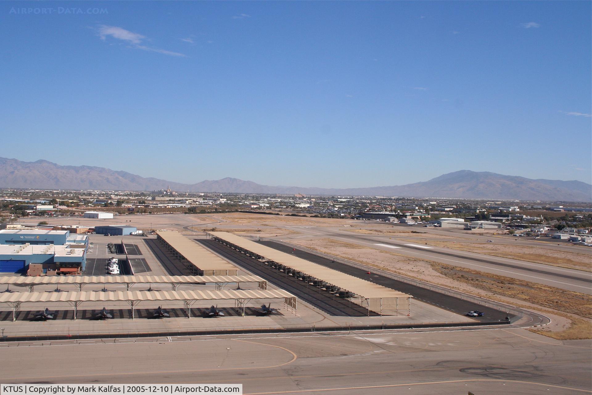 Tucson International Airport (TUS) - On approach RWY 11L KTUS with the 162nd Fighter Wing, Arizona ANG hangars and a slew of F-16's.