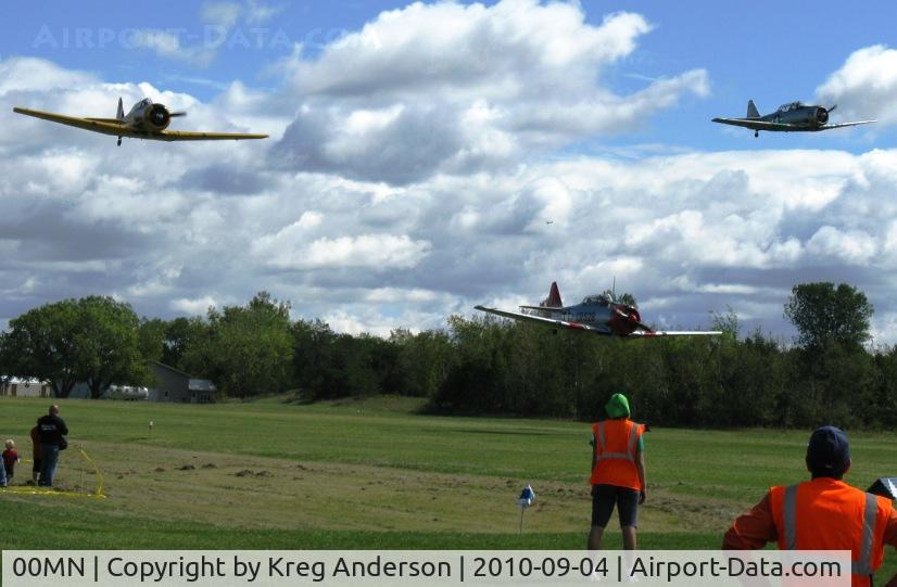 Battle Lake Municipal Airport (00MN) - A low T-6 flyover at the 4th annual Gerry Beck Memorial Fly-in at Battle Lake, MN.