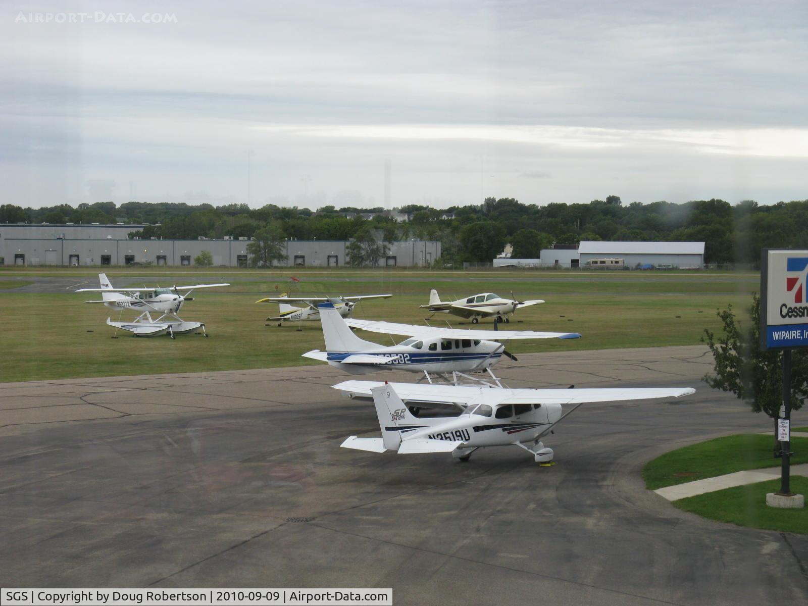 South St Paul Muni-richard E Fleming Fld Airport (SGS) - WIPAIRE, INC. Cessna Dealer, Manufacturer-WIPLINE Floats. WIPAIRE's ramp
